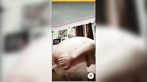 Desi bhabhi exposes her body parts in a webcam session.