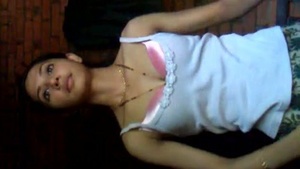 A naughty college girl gets caught masturbating by her lover in this homemade video.