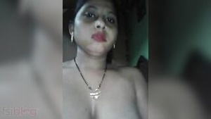 A beautiful strip of a mature house wife with a shaved pussy.