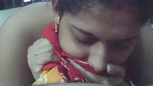 Beautiful Indian woman gives blow job to her lover.
