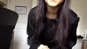 A sexy teenage girl dancing and fingering herself.