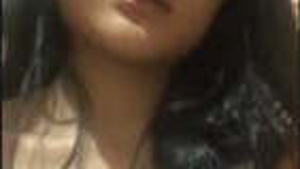 A hot Nepali woman flaunts her charms.