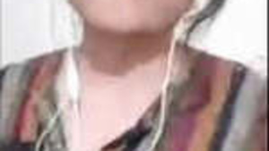 Young Pakistani girl playing with her breasts