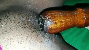 An Indian girl pleases herself and takes a selfie.