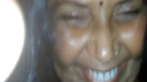 Big-chested woman has affair and sends provocative videos to her lover.