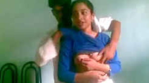 A beautiful college student’s breasts and vagina are kissed by her classmate in the lecture room.