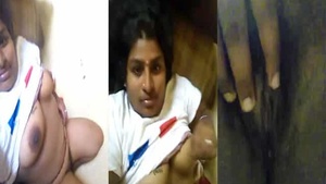 A hot Indian housewife shares her body parts in front of the camera.