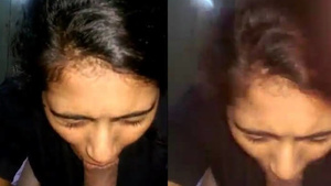 Indian girlfriend giving a blowjob in a hot scene.