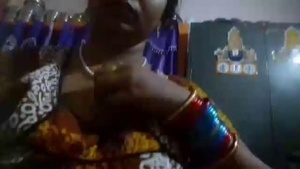 Aunt with big boobs in a South Indian housewife gets into steamy action.