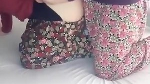 Young girls in hijab sing azan Islamic call to prayer