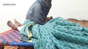 The man believes that the Indian stepmother will be happy with the gift he is going to give her in the bedroom