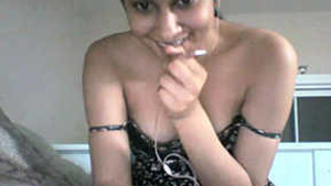 Pretty and hot figure of a Indian woman stimulating her breasts and pleasuring herself for her boyfriend.