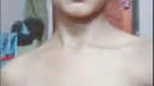 Beautiful Indian girl poses naked for a video.