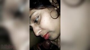 A hot Indian woman gives a blowjob to her friend in this xxx video.