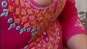 A big chested male figure in an Indian setting.