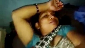A hot video of a rural Indian woman flirting with her roommate.