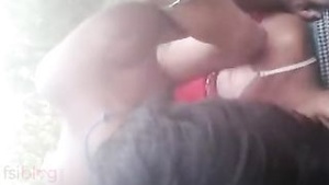 A young woman has fun in the outdoors with the help of her friends.