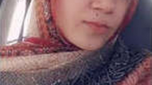 Pretty Indian woman showing her pretty smile and cute face.