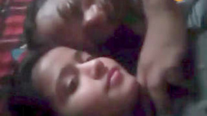 Pretty Indian girl and her lover in the bedroom