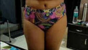 The hot wife of a husband returns home and he captures her on camera.