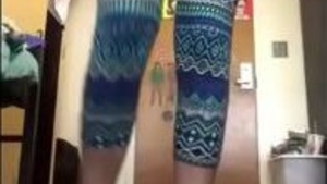 A beautiful Indian girl wearing a hot t-shirt masturbates in front of the camera.