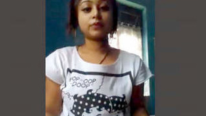 A sexy Indian woman undresses for her loved one.