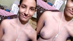 Tiny Indian cutie shows her booby and pussy.