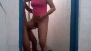 Big ass girl has sex with her young lover in the bathroom