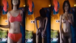 A naughty Indian girl dancing naked to a song.