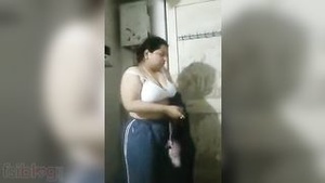 Desi flaunts her beautiful big chest in the bathroom.