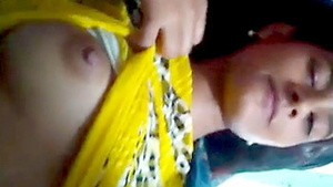 Pretty Indian girl in yellow chudidhar exposes her breasts