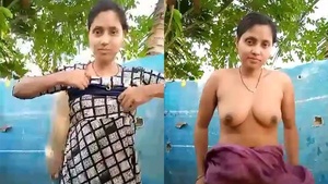 A Bengali woman undresses outside.
