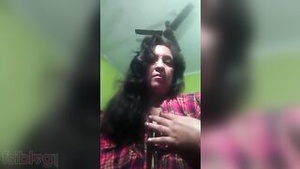 Naughty desi babe shows off her large breasts and seductively hints at more.