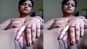 Steamy scene of hot Indian housewife stripping and teasing.