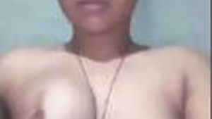 Shaking and bouncing boobs of a desi girl