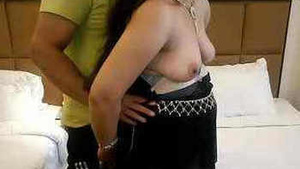 Aisha, an Indian house wife, has some fun with her friend while her husband is watching.