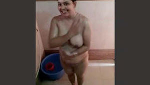 Steamy hot shower scene with an Indian MILF