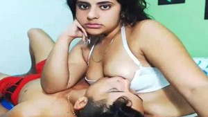 An Indian college student performs a live webcam show by giving her boyfriend oral sex.
