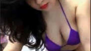 A small boobed desi girl strips and shows her big ass.