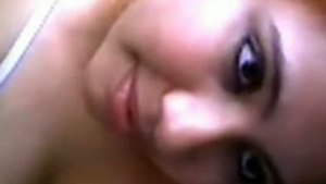 Pretty, chubby young woman undresses and masturbates in front of the camera for her boyfriend.