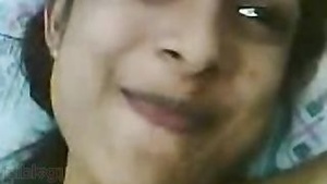 Young girl with smallbosoms uses her mobile to perform sexual acts and send them to her girlfriend.