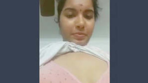 A young Tamil woman has made a video for her boyfriend.