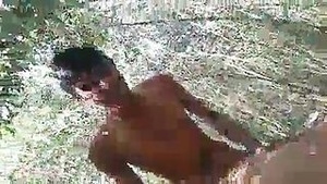 Young Indian woman has group sex outside