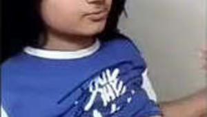 A sweet Indian girl pleases herself.