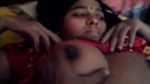 Hot scenes of the bhabhi with large breasts during home sex