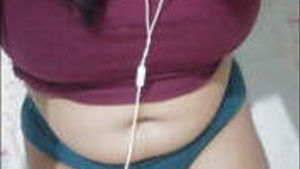 Beautiful Indian woman with large breasts enjoyed herself.