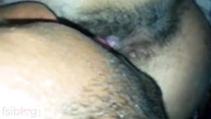 Indian man pleasuring his wife's pink pussy with his fingers and mouth