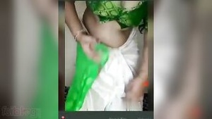 Hot stripchat video of Indian housewife showing her XXX assets.
