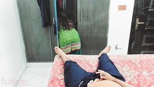 A hot Indian man masturbates while watching a pretty Pakistani woman clean the house.