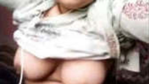 Beautiful woman displaying her beautiful breasts and vagina in this video.